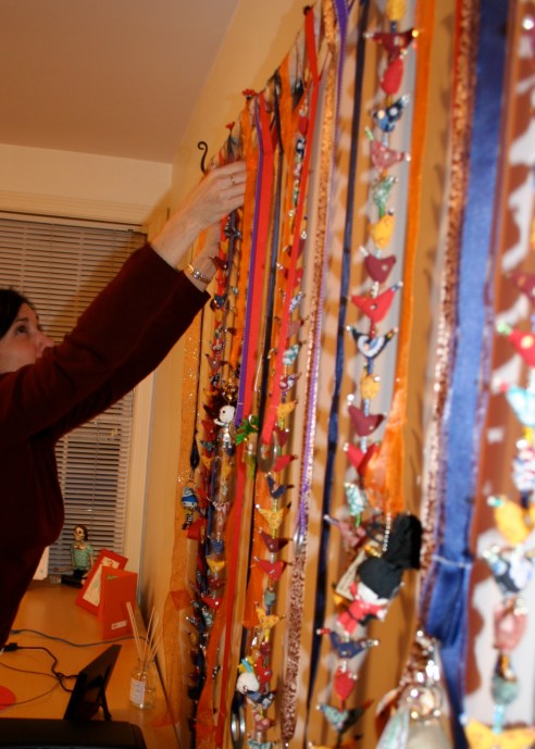 Joanne arranging the Prosperity Hens sculpture.