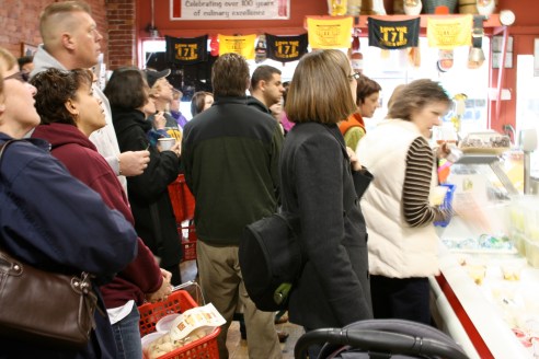 People were lined up five-deep, patiently waiting for their number to be called...just to buy cheese.  At this moment they were working on Customer 42 and I would have had to take #85 to start waiting my turn.