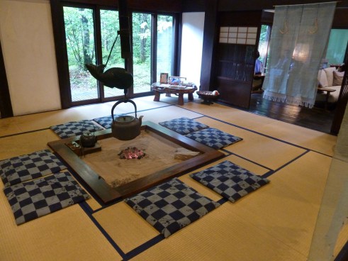 This is an old traditional Japanese kitchen, in the entrance to the Alps ryokan.  If you get to see the new Japanese move "Oshin" (based on an old popular TV series) it features a lot of these kitchens and is a really lovely film.