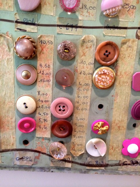My favorite pieces were a collection of French button samples that were previously used by salesmen to show their wares.  I spoke with the owner who told me he found the collection of six large wooden panels in an antique shop in Wiscasset, Maine