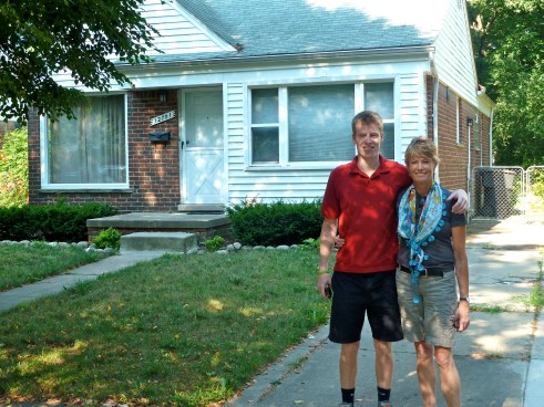 In front of my childhood home with my middle son Gray