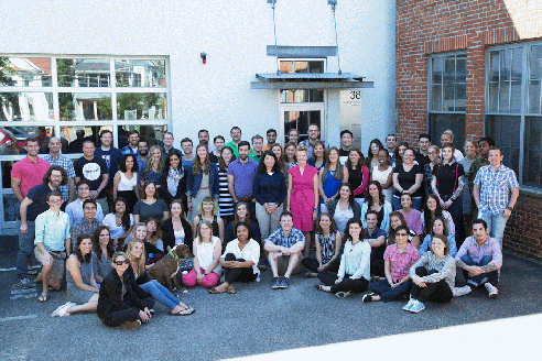 HiResGIFTeamPhotowithInterns_Waving